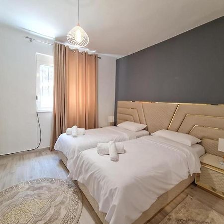 Home Center Корча Екстер'єр фото